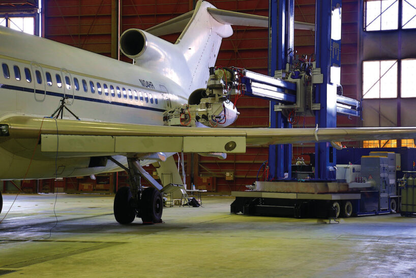 The laser coating removal robot (LCR) uses intelligent process monitoring to precisely and safely remove paint and other coatings from full-body aircraft. Image: Southwest Research Institute